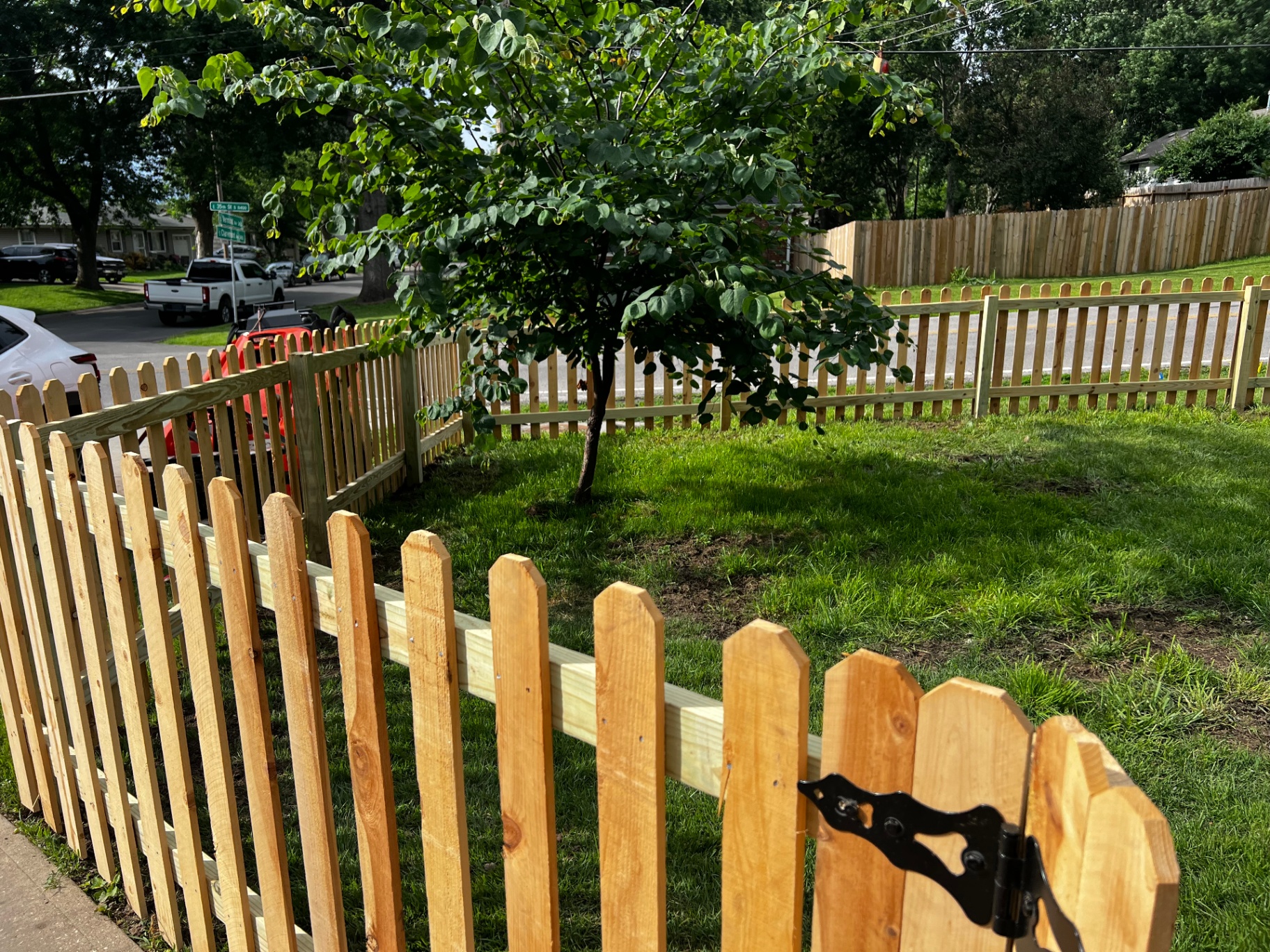 6 ft privacy Japanese cedar fence wrapping a corner yard with gate in Independence, MO 6 ft privacy Japanese cedar fence wrapping a corner yard with gate in Independence, MO